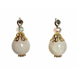 Kuukivi. Metallosad: kullatud.