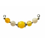 Käevõru keskne element. Nefriit/kuukivi/tsitriin. Metallosad: hõbedast värvi.